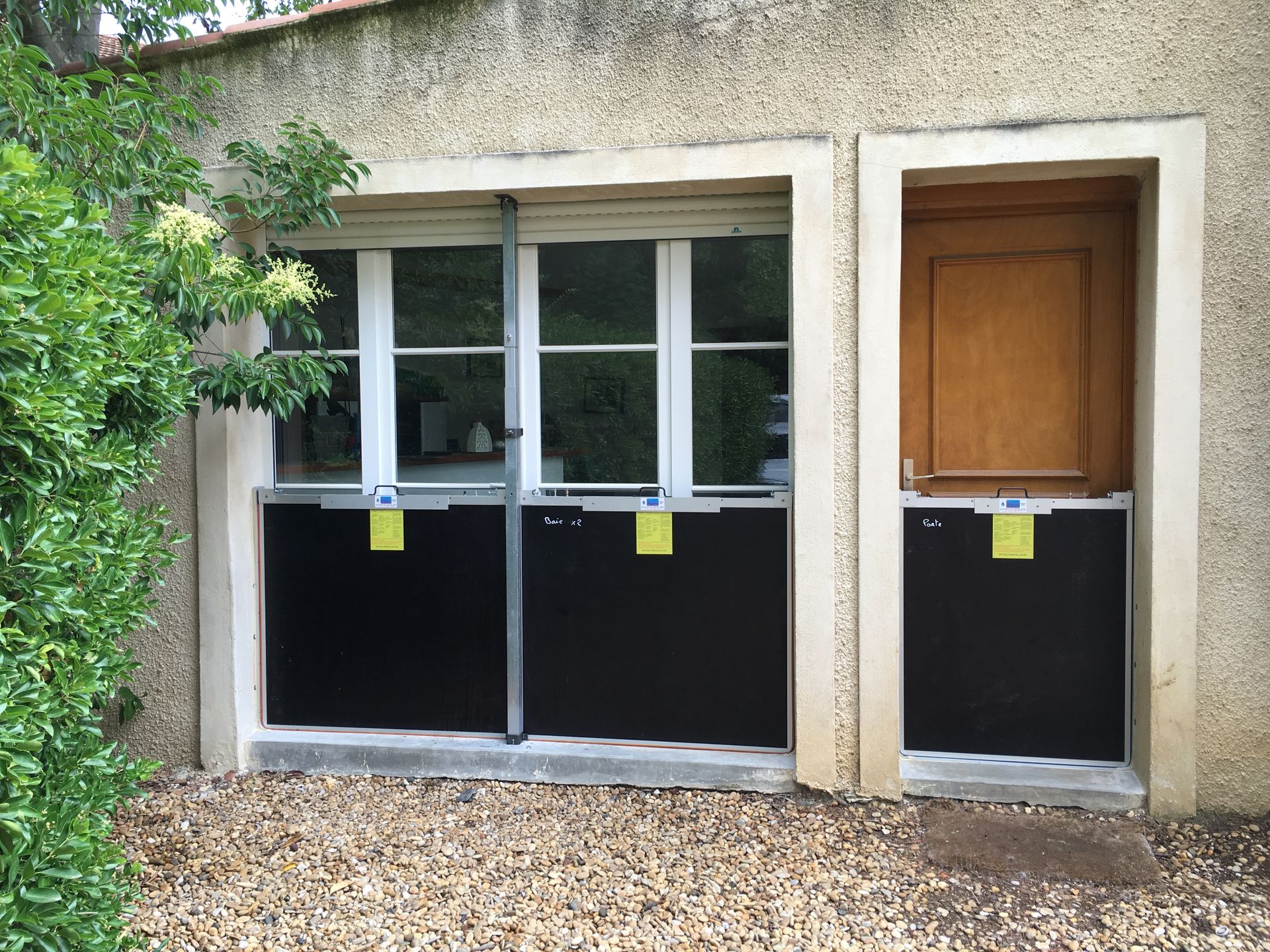 Baie vitré et porte equipé d'un batardeau